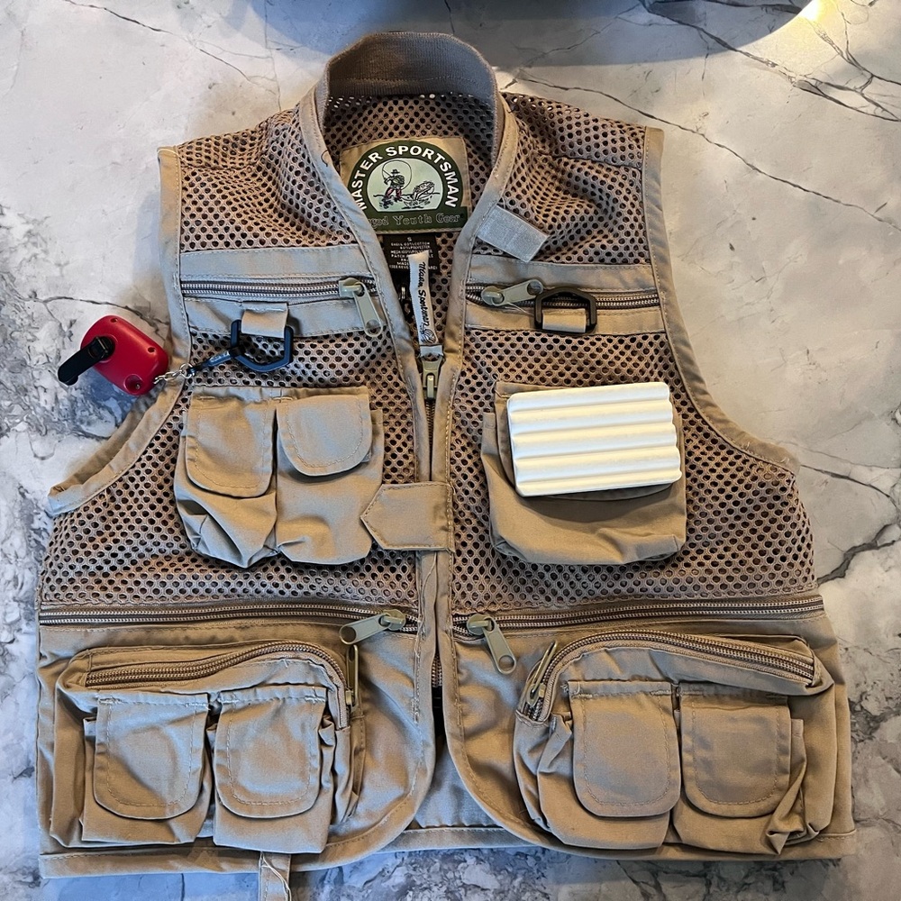 Tan Outdoor Vest with Breathable Mesh Fabric and Utility Design